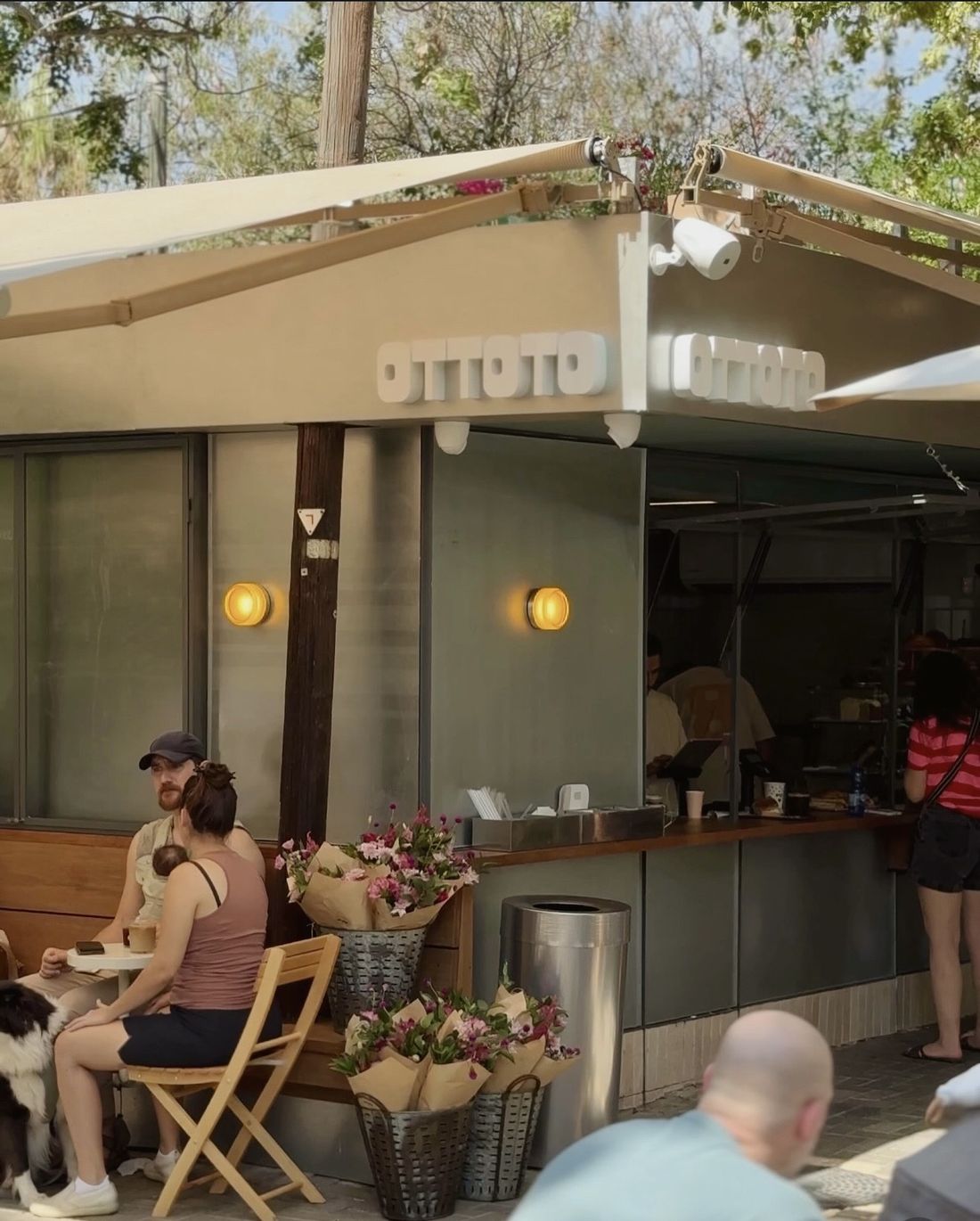 The OTTOTO kiosk with its awnings, flowers and terrace seating